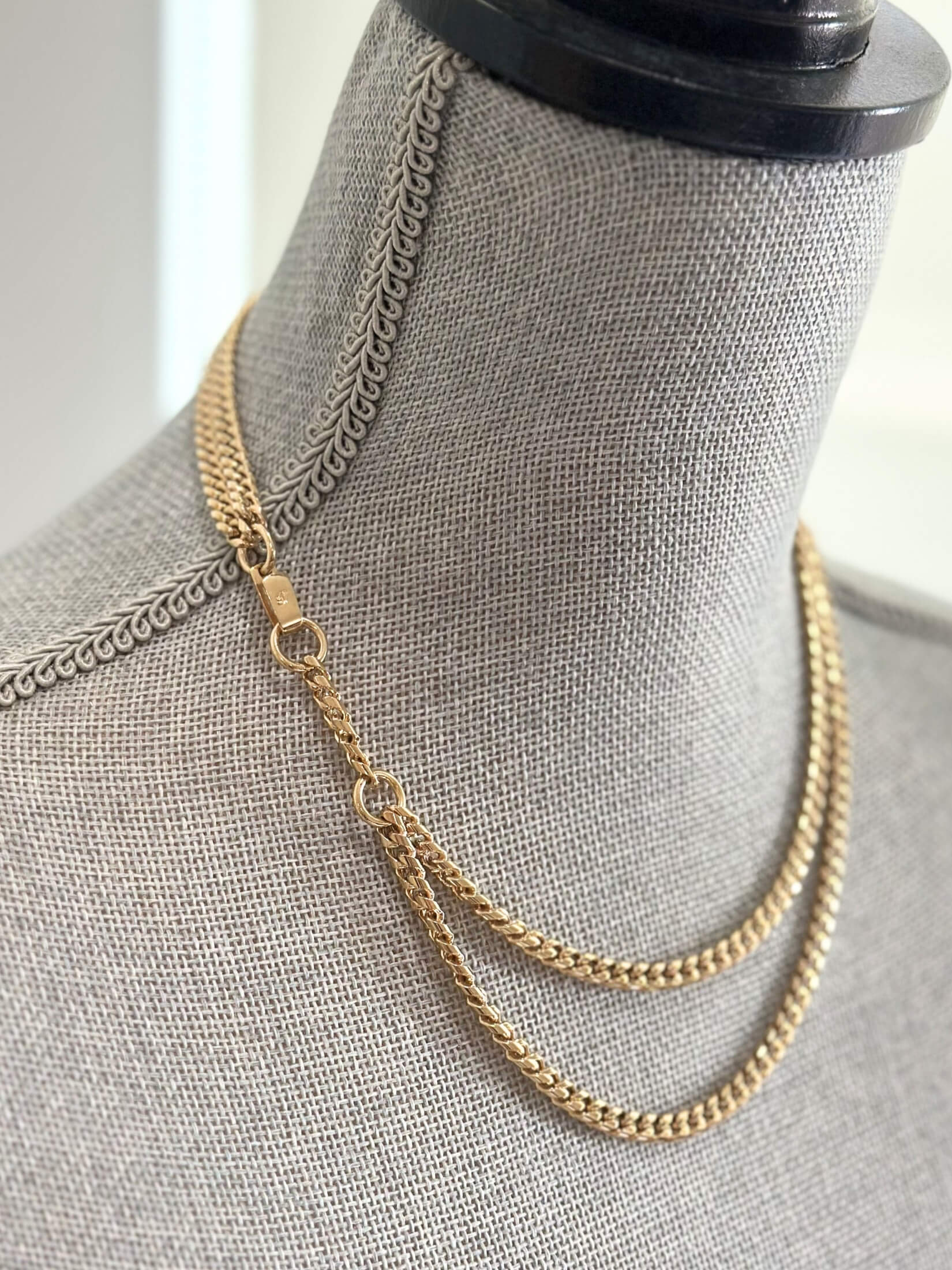 Louise Row featuring Jennifer Fisher curb chain gold necklace 2 row on grey mannequin