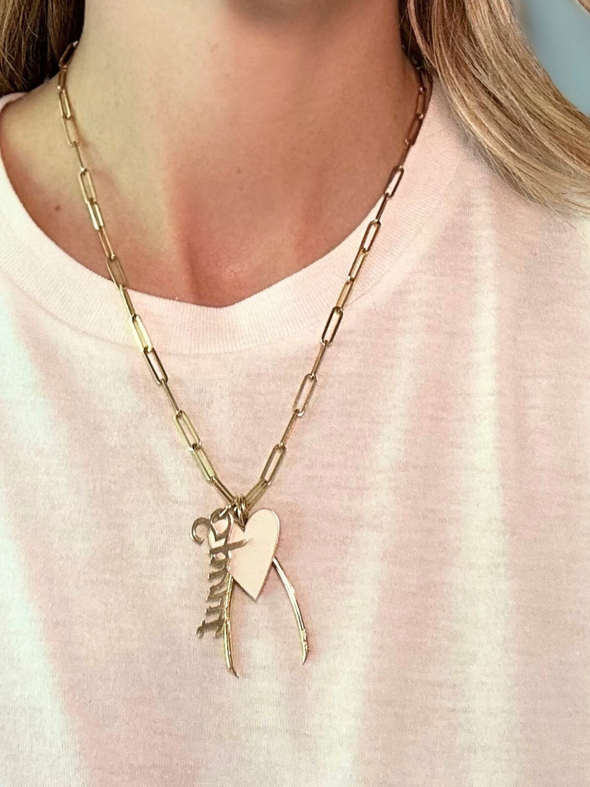 Louise Row featuring Jennifer Fisher necklace and charm on model