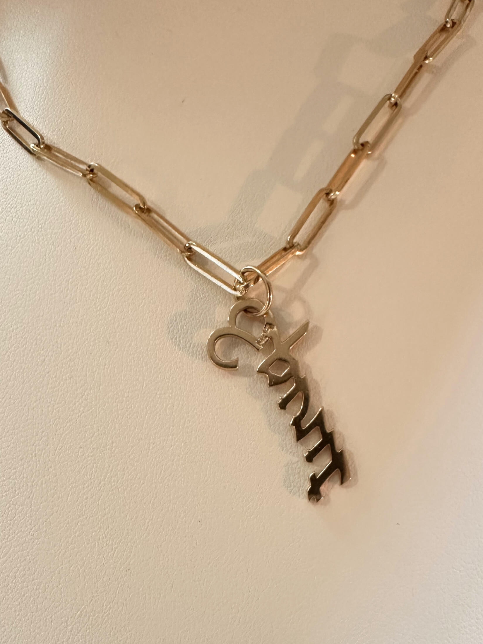 Louise Row featuring gold spirit Jennifer Fisher Charm in box