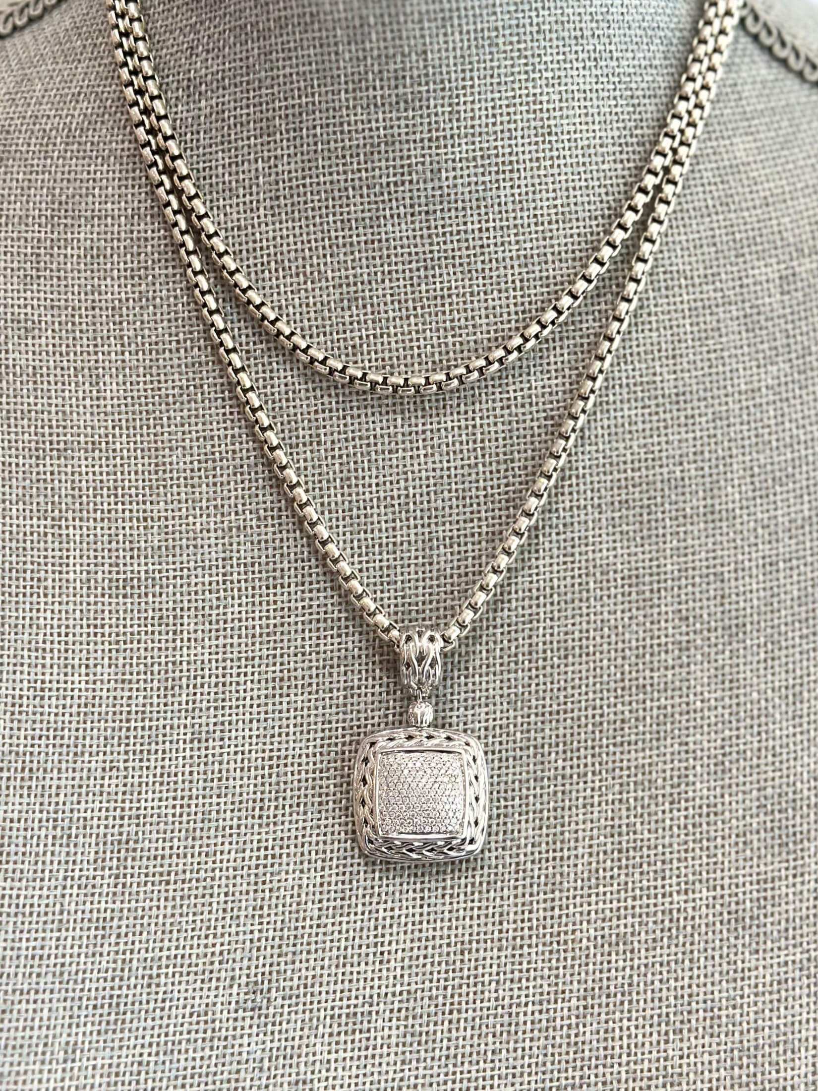 Louise Row featuring John Hardy Diamond Pendant in silver on grey mannequin