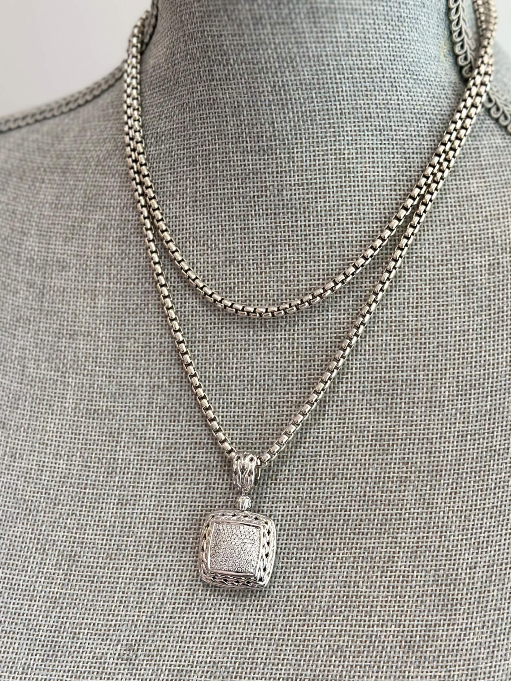 Louise Row featuring John Hardy Diamond Pendant in silver on grey mannequin
