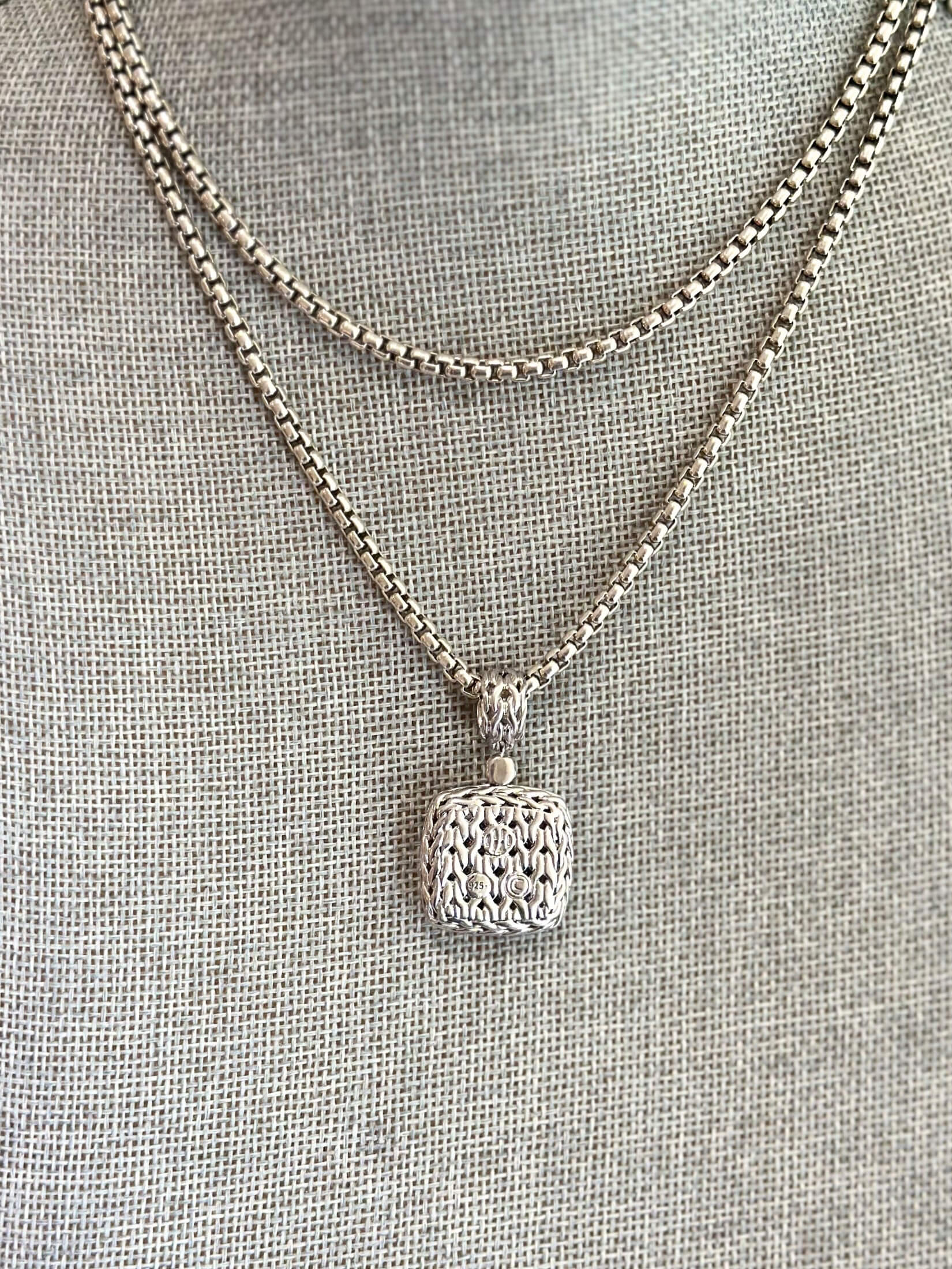 Louise Row featuring John Hardy Diamond Pendant in silver on grey mannequin
