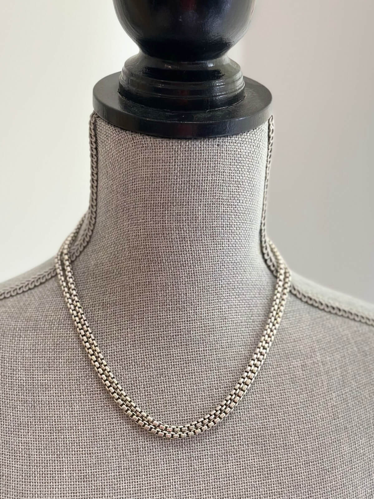 Louise Row featuring John Hardy Classic box chain on grey mannequin
