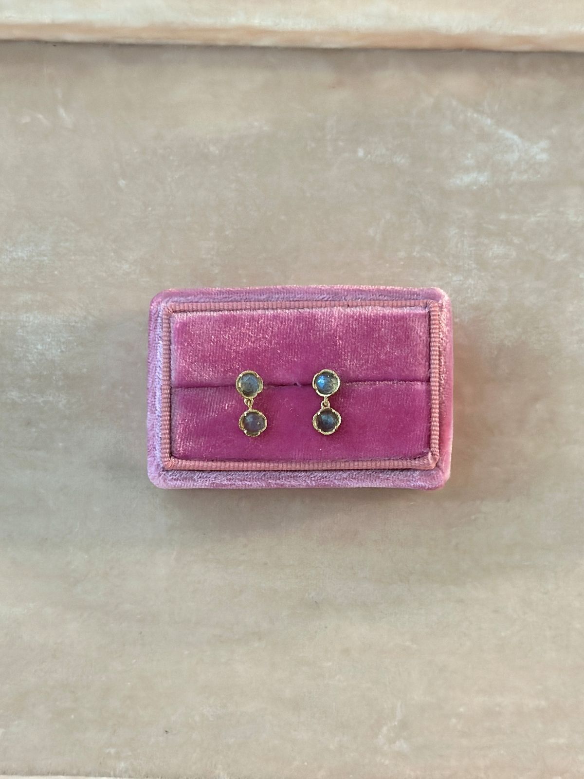 Louise Row Studio labradorite and 18K 2 drop earrings on  Pink velvet jewelry box on a pink pad 