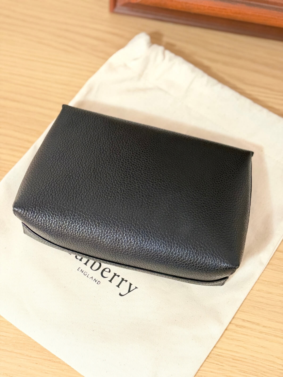 Louise Row featuring Mulberry Cosmetic Bag in black on table