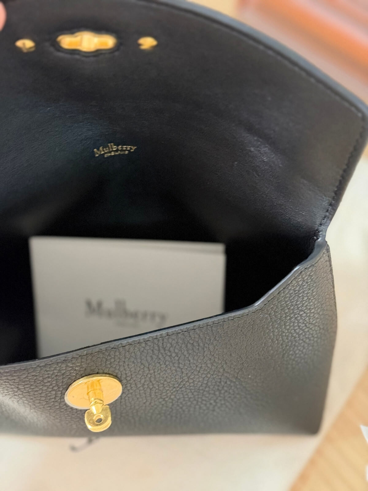 Louise Row featuring Mulberry Cosmetic Bag in black on table