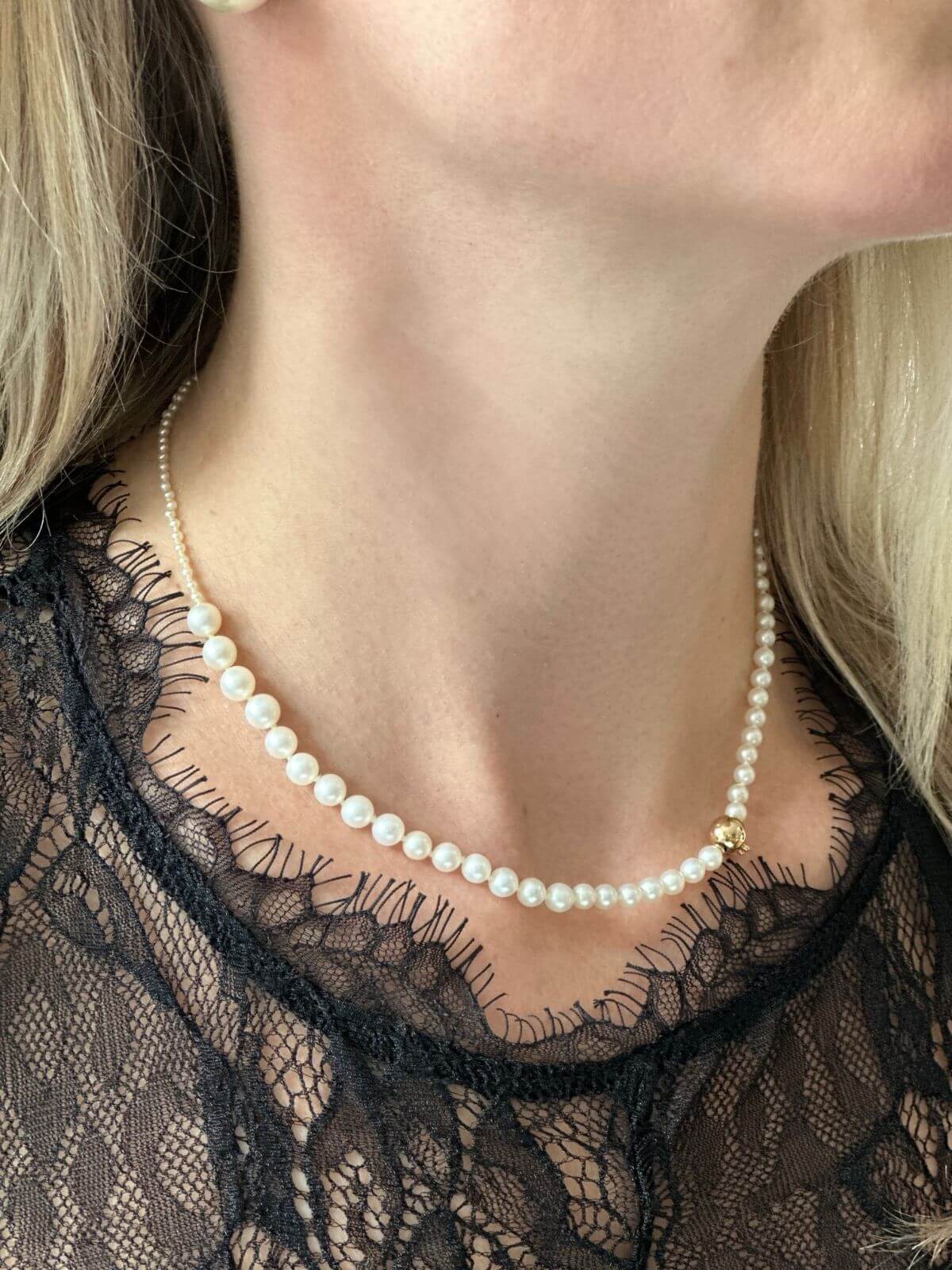 Sophie Bille Brahe freshwater pearl necklace on model in white shirt