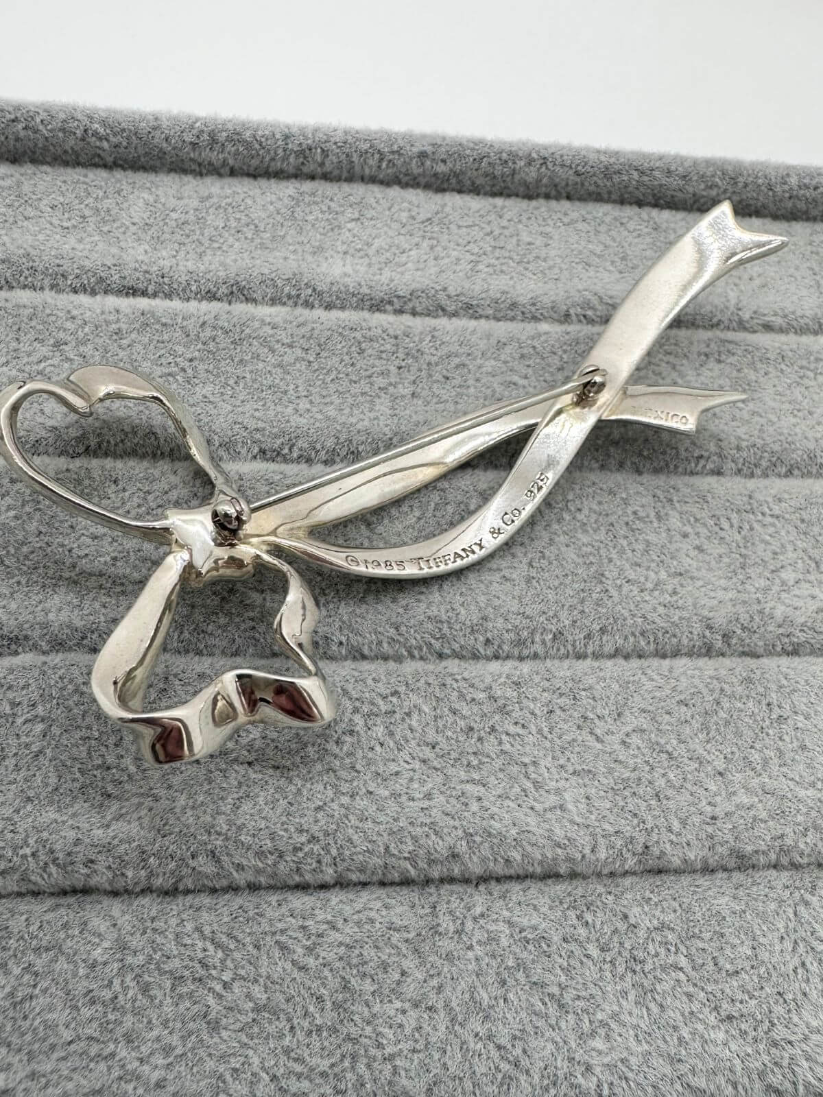 Tiffany bow brooch showing signature on back side