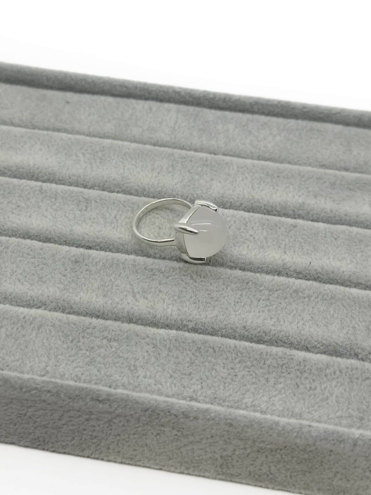 Tiffany silver and quartz ring on grey background