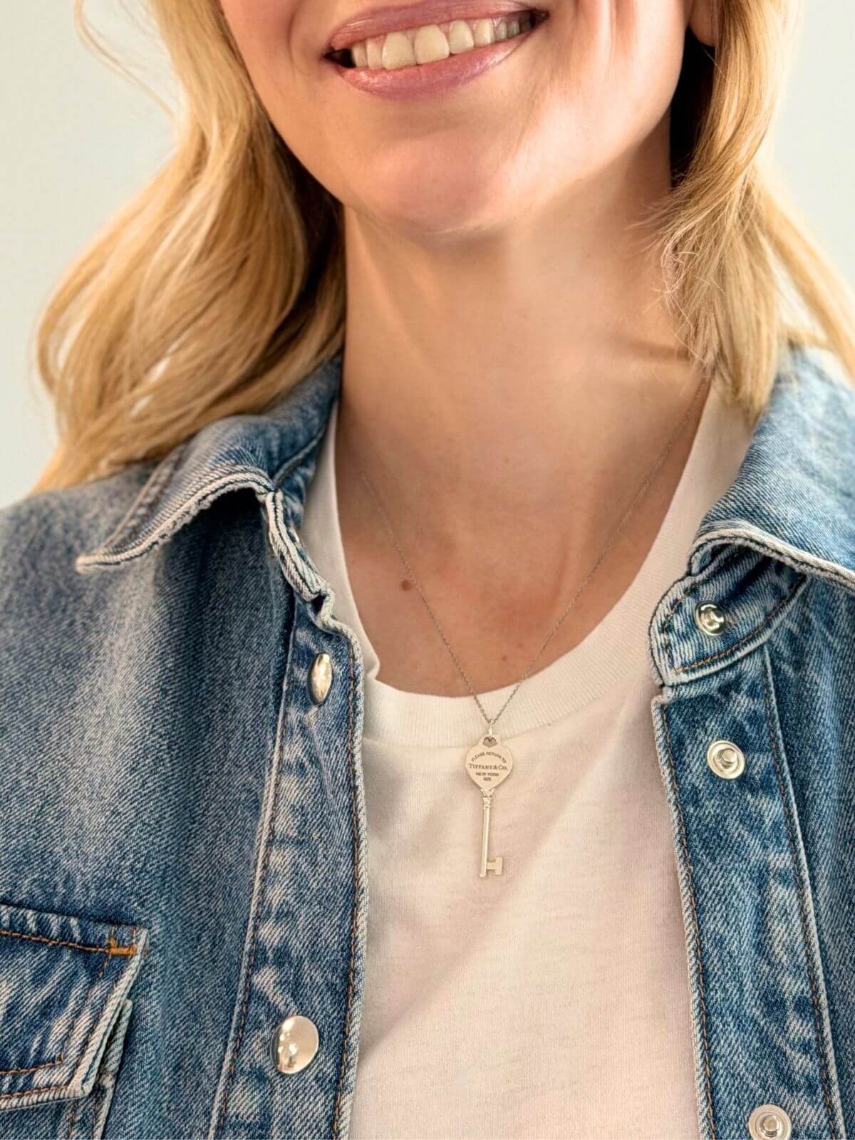 Louise Row featuring model in Tiffany Heart Key necklace