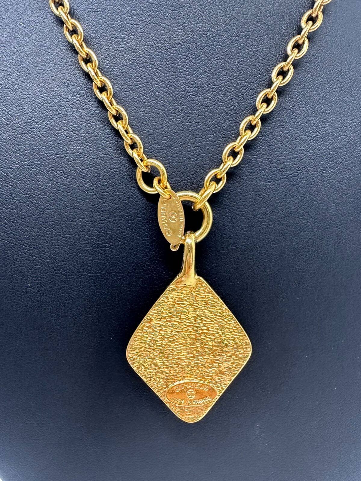 back of gold chanel diamond necklace. 