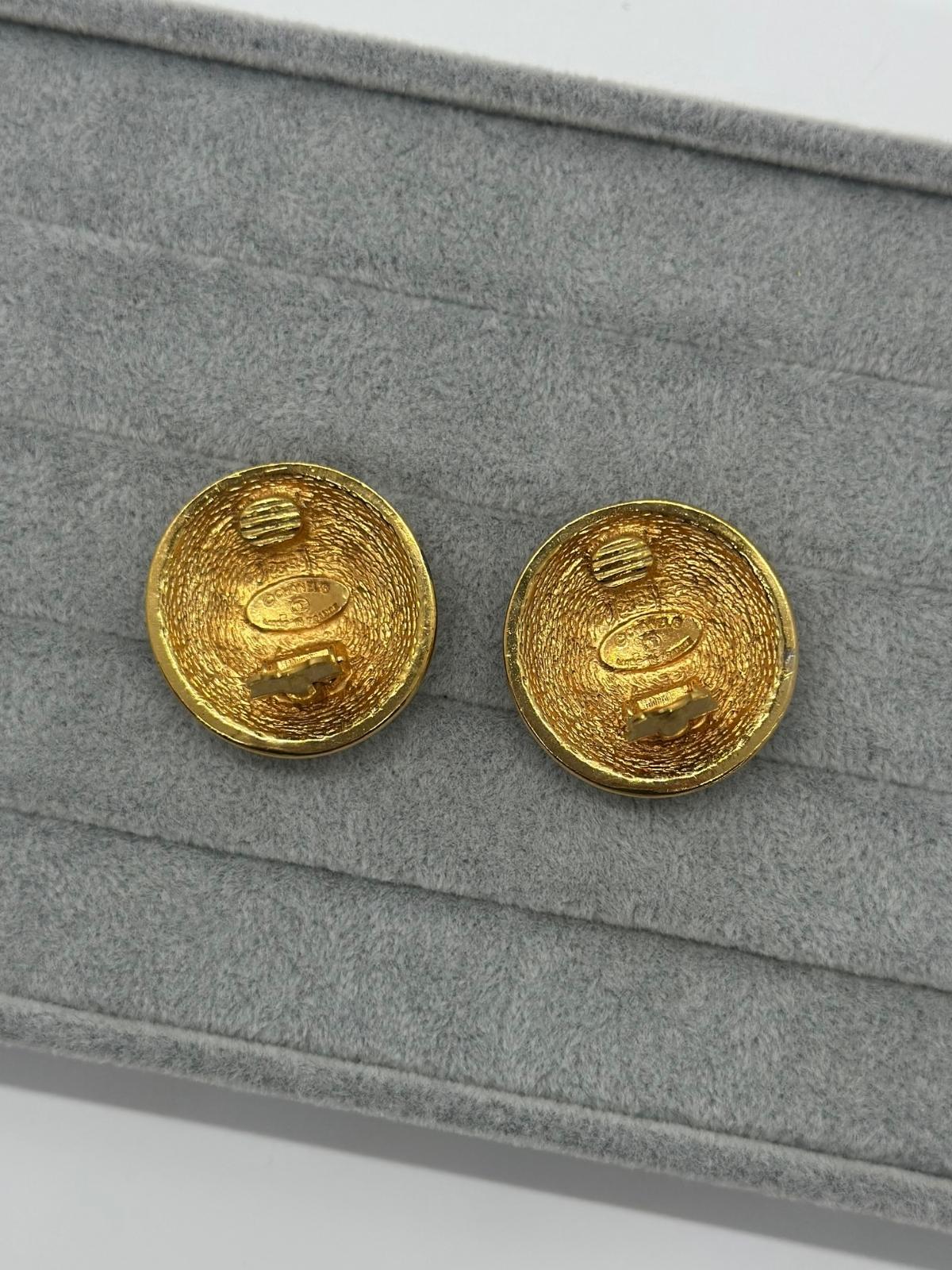 Vintage Chanel Matelasse Round Earrings on grey backround , Back view