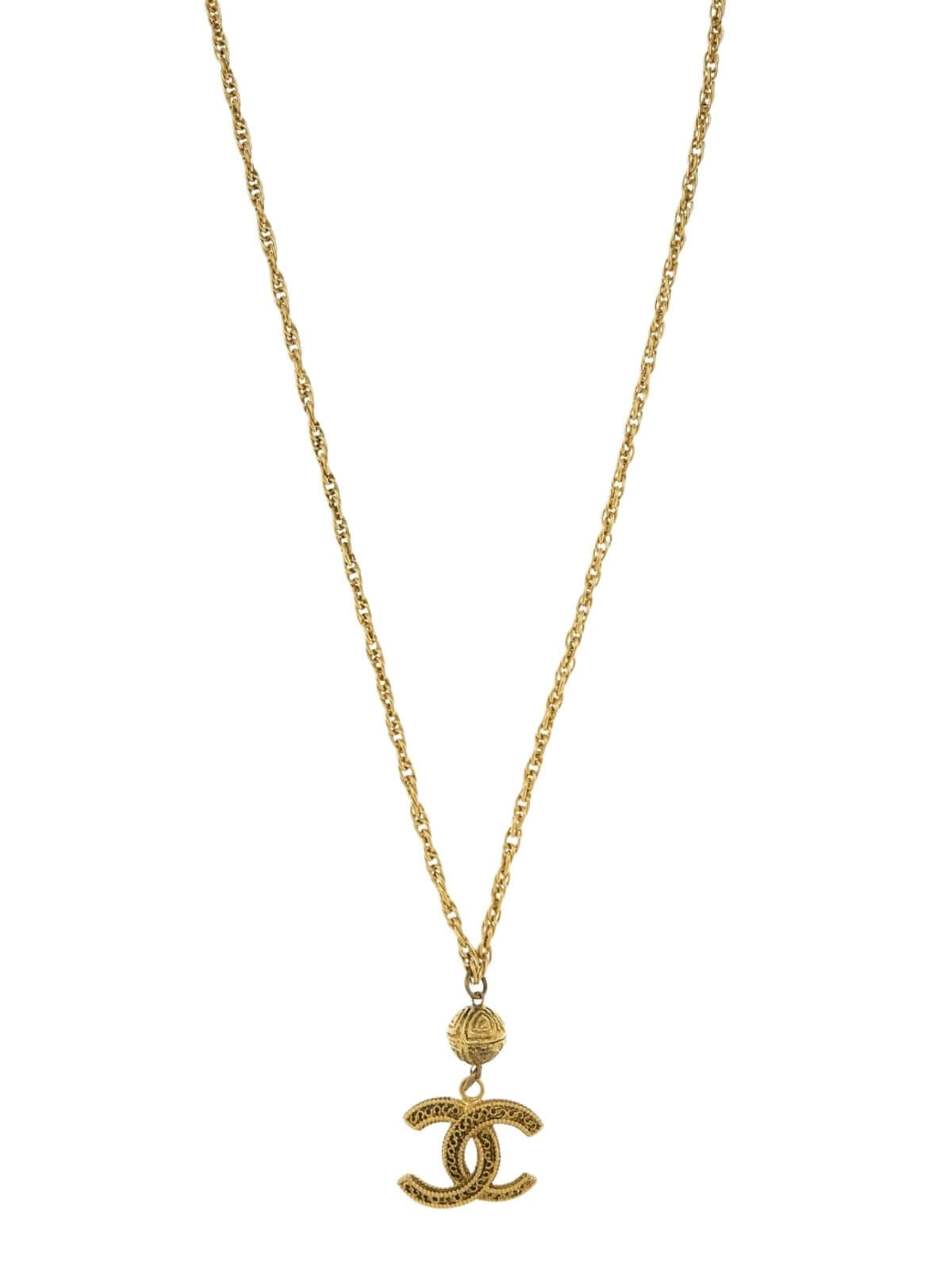 Gold necklace with a CC pendant on a white background