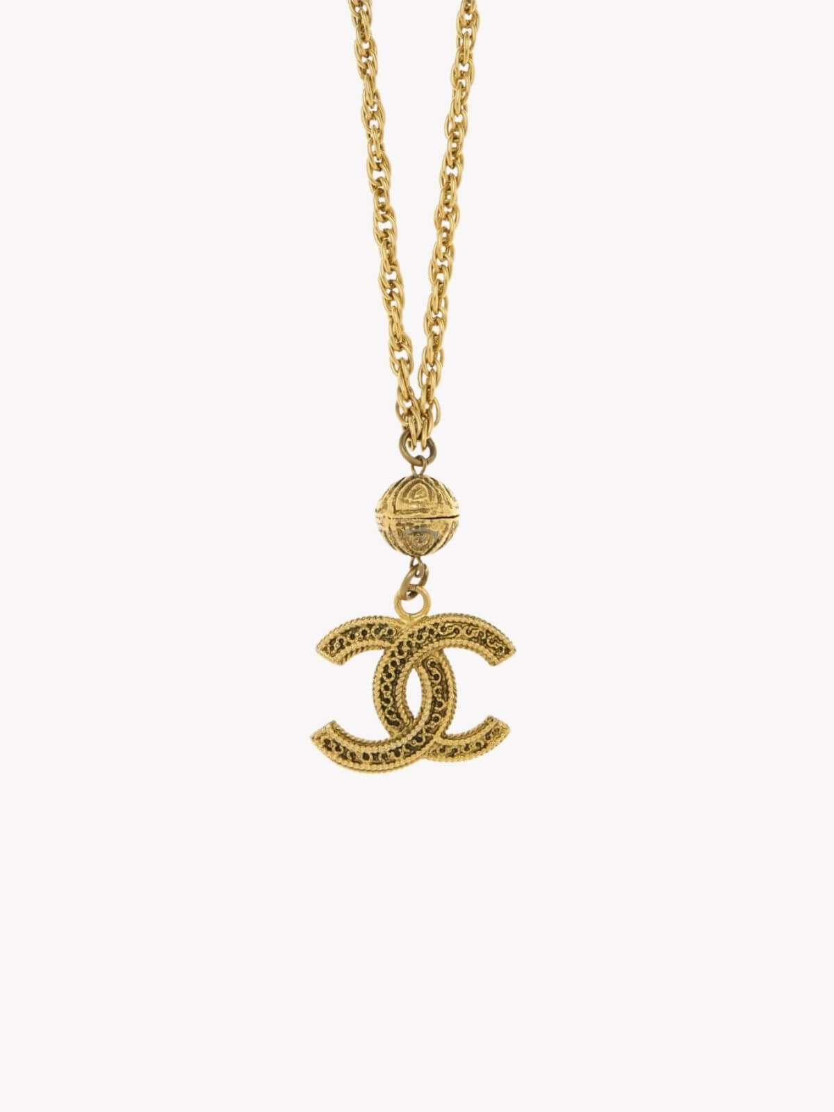 Louise Row Studio vintage Gold Chanel necklace with a CC pendant on a white background
